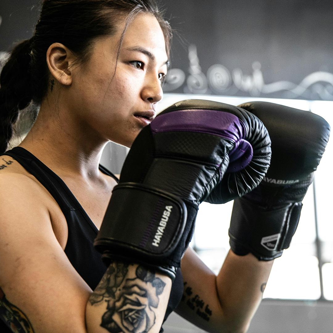 Woman wearing T3 Purple Palette Gloves